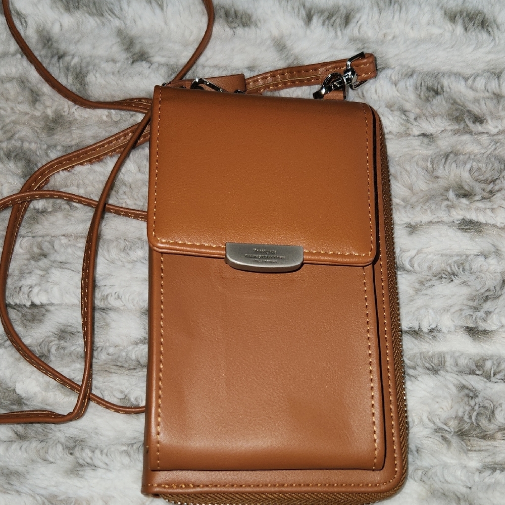 Tan Leather Wallet with Adjustable Strap and Flap Closure